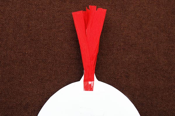 MORE IDEAS - Make a crepe paper crest (Step 2).