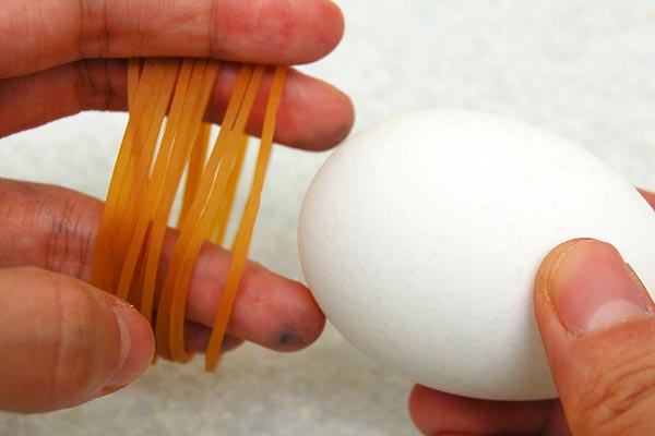 STEP 2 Rubber Band Dyed Easter Eggs